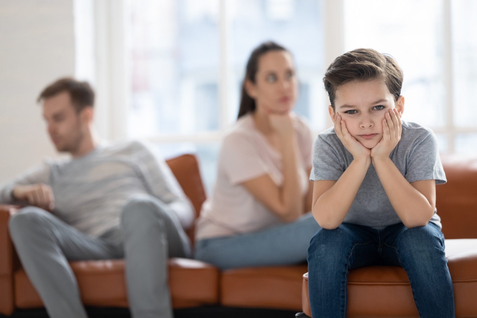 Parents et adolescent lors d'un entretien familial